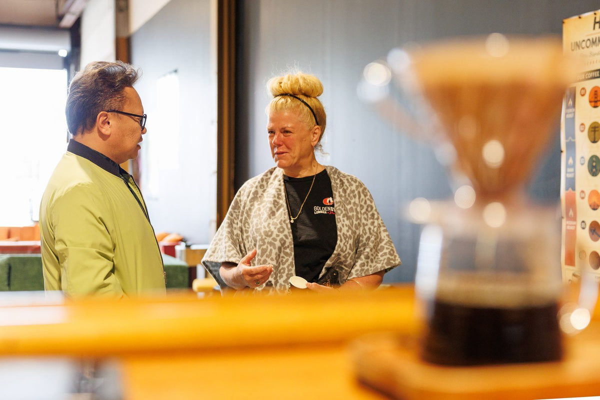 Guests tasting coffee at The House